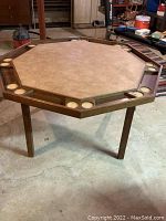 Full view of octagon poker table, top and cup holders visible