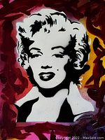 Close-up of stenciled Marilyn Monroe portrait on canvas with magenta, red and yellow abstract background.
