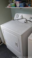 Front and top perspective of white dryer