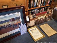 Overall view of five Civil War–themed pieces arranged on carpet in front of bookshelf