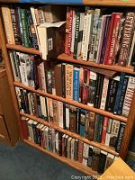 Photo showing multiple shelves filled with approximately 63 hardcover historical books focused on Gettysburg and related history.