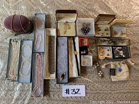 Overhead view of entire lot arranged on knit blanket