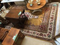 Full view of rug under furniture