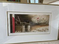 Framed print artwork showing a chicken and eggs in a barn, framed and matted in white frame, measuring approximately 22.25 by 14 inches.