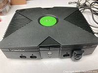 Front view of original Xbox console showing controller ports and power button