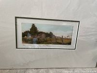 Colored etching showing a rural landscape with houses, trees, a fence, and a partly cloudy blue sky. Numbered 129/150, signed Richard Metzger.