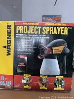 Front of original Wagner Project Sprayer box showing the sprayer unit and marketing text about its features and usage.