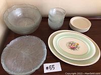 4 large glass textured leaf plates, 2 large glass serving bowls, 8 small textured glass bowls stacked, 5 Johnson Bros floral side plates stacked