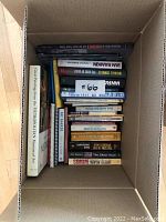 Box of 30 assorted books including Pat Barker novels and Jewish literature.