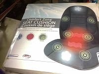 Box of Comfort Zone Seat Cushion showing the seating area with massage zones highlighted.