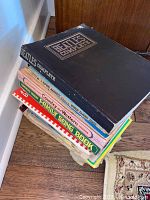 Stack of six music books including The Beatles Complete, Reader's Digest Country and Western, Reader's Digest Family Song Book, Irish Music, Peter Paul and Mary.