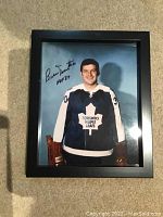 Framed 8x10 color photo of Bernie Parent in Toronto Maple Leafs jersey showing autograph on the photo