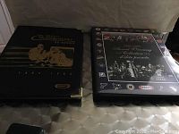 Two black hardcover Kraft NHL hockey card albums from 1993-94 and 1994-95 shown side by side, closed.