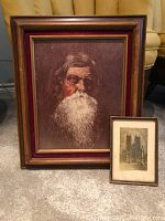 Two framed art pieces: larger portrait of elderly man and smaller cathedral print, showing overall condition and framing details