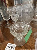 Six vintage glassware pieces together showing the mix of textures and shapes
