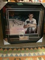 Front view of framed color photograph signed by Bobby Orr