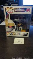 Front view of the Funko Pop box showing Power Rangers White Tigerzord figure numbered 668 with Hot Topic exclusive sticker and pop protector