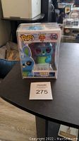 Front view of unopened Funko Pop! Bunny #532 in protective case on table