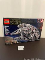 Front of unopened LEGO Star Wars Millennium Falcon set box, showing set image and LEGO logo.