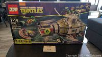 Front view of the boxed Lego Teenage Mutant Ninja Turtles Turtle Sub set showing the full box art and product information.
