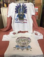 Two XL white baseball T-shirts with World Series and Champions Toronto prints plus two white All-Star Game caps