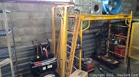 Overall view of stacked MetalTech scaffolding parts in corner