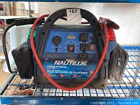 Front view of Nautilus Recreational Power Pack with red cable and control panel visible.