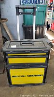 Front view of wheeled toolbox with Industrial Scrapworks branding and two drawers plus bottom bin