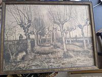 Framed monochrome Van Gogh print depicting pollarded birch trees, woman, and sheep along a rural path.