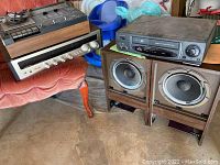 Overview of receiver, cassette deck, VHS player and two speakers