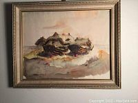 Full view of the framed watercolour painting depicting the coastal scene with boats and cottages.