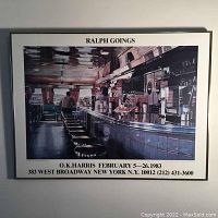 Framed print featuring Ralph Goings diner scene with exhibition text and gallery contact info visible.