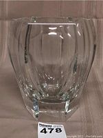 Front view of clear faceted vase