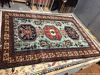 Full top-down view of the entire rectangular rug laid flat on floor