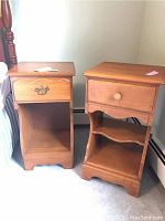 Photo of two wooden night stands side-by-side showing drawer styles and open shelves