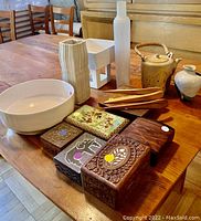 Shows entire lot with wooden spoons, vases, teapot, ceramic bowl and decorative boxes