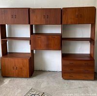 Full assembled front view of the three-section modular wall unit