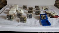 All Sankyo and Robin music boxes laid out, including covered, see-through, and mobile types, with extra parts shown