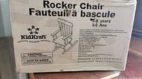 Box of KidKraft Kids Rocking Chair with product details, dimensions and age recommendation printed on the box.