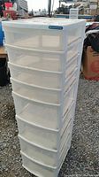 Full view of the white plastic 8 drawer tower storage unit.