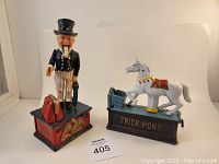 Full view of Uncle Sam and Trick Pony mechanical banks showing size, color, and overall condition