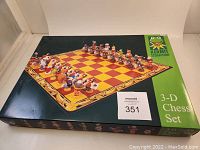 Box top showing the full chessboard with 3-D character pieces from the Kermit Collection lined up for play.