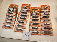 Full lot of 22 new Matchbox cars on cards showing variety of models and colors