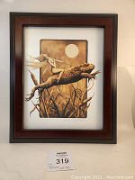 Full view of framed artwork showing a fairy riding a frog under a full moon.