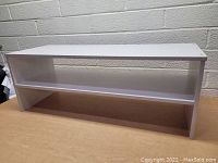 White wooden 2 tier organizer shelf angled view