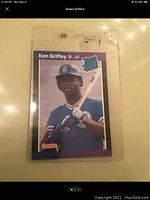 Front of Ken Griffey Jr 1989 Donruss rookie baseball card with 'Rated Rookie' logo and team uniform visible.