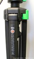 Close-up of Cullmann 2903 branding and lime green latch on tripod leg.