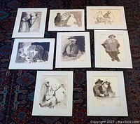 Eight mounted reproduction prints from Steven Oshatz's Men in the Park series laid out on a patterned rug.