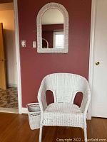 Photo showing full set against a red wall, with mirror, chair and wastebasket visible