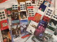 Spread of sealed Canada Post stamp booklets in various themes and denominations